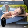 A woman relaxing in an inflatable hot tub. Produktbild-Vorschau
