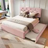 A pink upholstered bed with a pull-out trundle bed in a bedroom setting. Anteprima dell’immagine prodotto