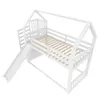 A white bunk bed with a slide and a house-shaped frame, shown from a high angle against a white background. Podgląd zdjęcia produktu