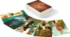 A stack of Dixit cards with some cards spread out in front of it. Anteprima dell’immagine prodotto