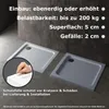 Two shower trays are shown on a dark gray tiled surface, with text overlays describing product features. Produktbild-Vorschau