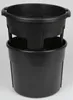 A black plastic potato grower insert placed inside a larger black plastic bucket. Produktbild-Vorschau