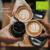 Three hands holding cups of coffee and a glass of iced coffee, with text overlays and a certification logo. Produktbild-Vorschau