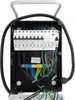 An open electrical distribution box with visible wiring and circuit breakers. Produktbild-Vorschau