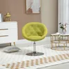 A lime green accent chair is placed in a room with a white dresser and a small round coffee table. Produktbild-Vorschau