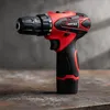 A cordless drill is placed on a textured surface. Produktbild-Vorschau