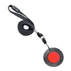 A black lanyard with a red button device attached. Produktbild-Vorschau