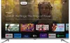 A television screen displaying a smart TV interface with various streaming service logos and content. Náhled obrázku produktu