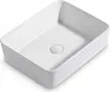 A white ceramic sink with a drain in the center. Podgląd zdjęcia produktu