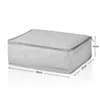 A polka-dotted storage bag with dimensions indicated. Voir les images du produit