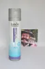 A bottle of Londa Professional Toneplex Pearl Blonde Shampoo is placed next to a framed photograph of a man. Produktbild-Vorschau