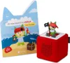A children's pirate-themed coloring book and a Toniebox speaker with a pirate figurine. Produktbild-Vorschau