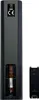 The back of a black TV remote control with the battery compartment open, showing batteries and a separate battery cover. Produktbild-Vorschau