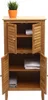 A wooden cabinet with two shelves and two doors on each shelf, containing folded towels. A potted plant sits on top of the cabinet. Podgląd zdjęcia produktu