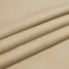 A close-up view of beige fabric, showing its texture and folds. Náhled obrázku produktu