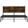 A metal bed frame with a wooden headboard. Produktbild-Vorschau