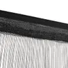 A close-up view of black string curtains hanging from a rod. Produktbild-Vorschau