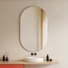 A bathroom vanity with a sink and mirror. Produktbild-Vorschau