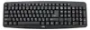 A black keyboard is shown from a slightly elevated front view against a light gray background. Náhľad obrázku produktu