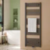 A modern bathroom with a bathtub, a small stool, and a towel warmer. Produktbild-Vorschau