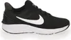 A black Nike Star Runner 4 sneaker with a white Nike swoosh logo is shown from the side against a white background. Voir les images du produit