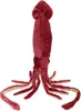 A plush toy squid against a white background. Podgląd zdjęcia produktu