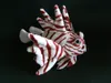 A plush toy of a lionfish against a black background. Produktbild-Vorschau