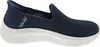 A side view of a navy blue Skechers slip-on sneaker with a white sole. Produktbild-Vorschau
