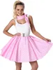 A woman wearing a pink and white polka dot skirt and a white top, posing for a product photo. Podgląd zdjęcia produktu
