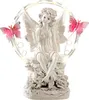 A white fairy figurine with pink butterflies and LED lights. Produktbild-Vorschau