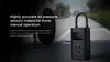 A portable air compressor is shown on a road, with text highlighting its features. Produktbild-Vorschau