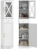 A white bathroom cabinet shown from two angles, one closed and one open, displaying its interior storage. Anteprima dell’immagine prodotto