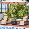 Two beige lounge chairs with a small table and umbrella next to a swimming pool. Produktbild-Vorschau