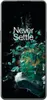 A smartphone with a dynamic wallpaper featuring abstract green and gold shards against a black background. Produktbild-Vorschau