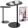 Two black metal side tables are shown against a white background. One table is larger and has a phone and mug on it. The other table is smaller and to the left. A product box is visible on the right. Voir les images du produit