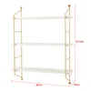 A three-tiered wall shelf with a gold metal frame and white shelves, shown against a white background with dimensions indicated. Voir les images du produit
