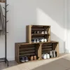 A set of wooden crates used as a shoe rack in an entryway, with a coat rack on the left. Anteprima dell’immagine prodotto