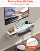 A wall-mounted TV stand with a TV mounted above it, showcasing a router and other items on the stand. Náhľad obrázku produktu