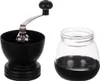 A manual coffee grinder and a glass coffee container are displayed against a white background. Náhľad obrázku produktu