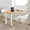A small dining table with two chairs in a bright room with a window. Náhľad obrázku produktu