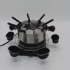 A fondue set with multiple forks and dipping cups. Produktbild-Vorschau