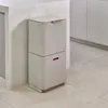 A two-tiered trash and recycling bin is shown in a kitchen setting. Podgląd zdjęcia produktu