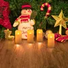 Christmas-themed scene with a snowman, Christmas tree, ornaments, and LED candles. Náhled obrázku produktu