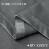 A close-up view of a dark gray velvet curtain, showing the texture and stitching. Voir les images du produit