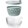 A salad spinner disassembled into its three main components: lid with handle, inner basket, and outer bowl. Produktbild-Vorschau
