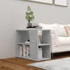 A concrete gray side table with books and a plant on it, placed next to a white sofa. Náhľad obrázku produktu