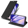 A black flip case for a smartphone is shown, with the phone inside and its screen displaying a colorful abstract image. The case is partially open, revealing the phone. Náhled obrázku produktu