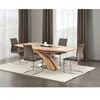 A dining table with chairs in a room with curtains and a rug. Produktbild-Vorschau