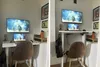A home office setup with a standing desk, monitor, laptop, and chair. Produktbild-Vorschau