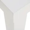A close-up view of the corner of a white table. Produktbild-Vorschau